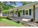 Inviting front porch with wooden columns and hanging flower baskets at 983 Willowbrook Ave, Rock Hill, SC 29730