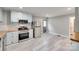 Kitchen featuring stainless steel appliances, butcher block counters, and light blue cabinets at 983 Willowbrook Ave, Rock Hill, SC 29730