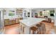 Spacious kitchen with a large island, stainless steel appliances, and an open layout into the living room at 10338 Hollybrook Dr, Charlotte, NC 28277