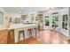 Bright kitchen with a large island, stainless steel appliances, and a cozy breakfast nook at 10338 Hollybrook Dr, Charlotte, NC 28277