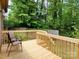 Spacious wood deck, with stairs, perfect for outdoor seating and relaxation with scenic wooded views at 1061 Nw 14Th Avenue Nw Dr, Hickory, NC 28601