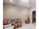 Bedroom featuring carpet floor, two upholstered armchairs, and an open door to a closet at 1061 Nw 14Th Avenue Nw Dr, Hickory, NC 28601