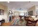 Inviting living room featuring a fireplace, hardwood floors, and plenty of natural light at 1061 Nw 14Th Avenue Nw Dr, Hickory, NC 28601