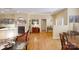 Open-concept living room with hardwood floors, a fireplace, and a doorway leading to another room at 1061 Nw 14Th Avenue Nw Dr, Hickory, NC 28601