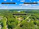 Aerial view showcasing the property's location near Downtown Mooresville and Village @ Bryers Crk Shops & Restaurants at 107 Blue Ridge Trl, Mooresville, NC 28117