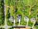 An aerial view highlighting the property's location and lot size with a generous, tree-lined backyard at 107 Blue Ridge Trl, Mooresville, NC 28117