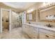 Elegant bathroom featuring dual sinks, granite countertops, stand up shower, and tile flooring at 107 Blue Ridge Trl, Mooresville, NC 28117