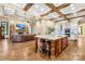 Expansive living area and open kitchen concept with views of the cozy living room and fireplace at 107 Blue Ridge Trl, Mooresville, NC 28117