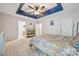 Large bedroom with blue accent ceiling and modern furniture, filled with natural light at 108 N Arcadian Way, Mooresville, NC 28117