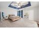 Spacious bedroom with light walls and a dark blue ceiling with a ceiling fan at 108 N Arcadian Way, Mooresville, NC 28117