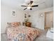 Inviting bedroom featuring a desk area, ceiling fan, and neutral walls at 108 N Arcadian Way, Mooresville, NC 28117