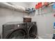 Functional laundry room with modern washer and dryer, maximizing space and efficiency at 108 N Arcadian Way, Mooresville, NC 28117