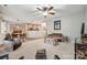An open living space with stylish seating flows seamlessly into the kitchen and dining nook at 108 N Arcadian Way, Mooresville, NC 28117