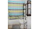 Small bathroom with colorful shower curtain and accessibility railing on toilet at 1111 Green Street Ext, Rock Hill, SC 29730