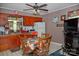 A functional kitchen with wooden cabinets and dining table, perfect for casual meals at 1111 Green Street Ext, Rock Hill, SC 29730