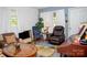 A cozy living area showcasing comfortable seating and a tranquil ambiance with ample natural light at 1111 Green Street Ext, Rock Hill, SC 29730