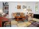 Cozy living room features an eclectic mix of decor and comfortable seating at 1111 Green Street Ext, Rock Hill, SC 29730
