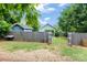 Private backyard with shed, pergola, and fenced perimeter offering a serene outdoor retreat at 1201 Pegram St, Charlotte, NC 28205