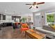 Open-concept living area with kitchen view, dining area, and ample natural light at 1201 Pegram St, Charlotte, NC 28205
