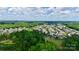 Aerial view of the neighborhood showcasing the surrounding trees at 1281 Arges River Dr, Fort Mill, SC 29715