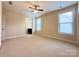 Spacious bedroom with two windows for ample natural light and neutral carpet and paint at 1281 Arges River Dr, Fort Mill, SC 29715