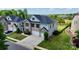 Charming two-story home with a brick facade, two-car garage, and landscaped yard at 1281 Arges River Dr, Fort Mill, SC 29715