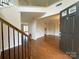 Open foyer with hardwood floors, staircase, and lots of natural light at 1281 Arges River Dr, Fort Mill, SC 29715