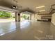 Spacious three car garage with epoxy floors, finished ceilings, and natural light and access at 1281 Arges River Dr, Fort Mill, SC 29715
