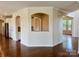Open-concept living space with dark hardwood floors at 1281 Arges River Dr, Fort Mill, SC 29715