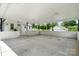 Spacious carport offering ample covered parking with an attached home and outdoor access at 1300 Nc 90 W Hwy, Taylorsville, NC 28681