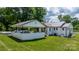 A white brick carport is attached to the home and features a white truck at 1300 Nc 90 W Hwy, Taylorsville, NC 28681