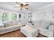 Bright living room with hardwood floors, comfortable sofas, and charming decor, ready for relaxation at 1300 Nc 90 W Hwy, Taylorsville, NC 28681
