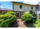 Backyard features greenery, access to patio, and home's HVAC system at 1330 5Th Ne St, Hickory, NC 28601