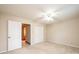 Cozy bedroom featuring neutral tones, carpet, ceiling fan, and closet space at 1330 5Th Ne St, Hickory, NC 28601