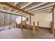 Covered back porch with wooden flooring, railings, and access to the backyard at 1370 Poole Rd, Salisbury, NC 28146
