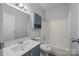 A clean, bright bathroom features a single sink and shower tub combination with modern fixtures at 1370 Poole Rd, Salisbury, NC 28146
