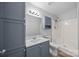 Full bathroom boasts a single sink, a shower-tub combo, and a medicine cabinet at 1370 Poole Rd, Salisbury, NC 28146