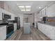 Well-equipped kitchen features stainless steel appliances and granite countertops at 1370 Poole Rd, Salisbury, NC 28146