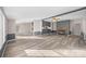 Spacious living room featuring a stone fireplace, ceiling fan, and modern flooring at 1370 Poole Rd, Salisbury, NC 28146