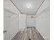 Bright walk-in closet features modern wood-look floors and wire shelving for easy organization at 1370 Poole Rd, Salisbury, NC 28146