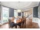 Formal dining room with hardwood floors, and a large table with seating for six at 14701 Jockeys Ridge Dr, Charlotte, NC 28277