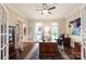 Inviting office space with rich hardwood floors, natural light, and refined furnishings at 14701 Jockeys Ridge Dr, Charlotte, NC 28277