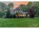 Landscaped back yard and patio area on a verdant lot at 157 Dedham Loop, Mooresville, NC 28117