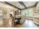 Elegant dining area with hardwood floors, exposed wood beams, and a view into an adjacent office at 157 Dedham Loop, Mooresville, NC 28117