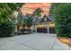 The home has a large garage and manicured landscaping that frames the front at 157 Dedham Loop, Mooresville, NC 28117