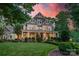 Charming two story home with manicured lawn and covered front porch at 157 Dedham Loop, Mooresville, NC 28117