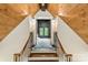 Upstairs hallway with hardwood stairs and trim leading into the main room at 157 Dedham Loop, Mooresville, NC 28117