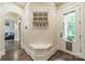 Functional mudroom with built-in storage, bench seating, and a convenient side entrance at 157 Dedham Loop, Mooresville, NC 28117