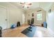 Home workout room with hardwood floors, weights, and exercise equipment at 157 Dedham Loop, Mooresville, NC 28117
