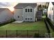 Backyard with a well manicured lawn, black metal fence and patio at 161 Old Harbor Dr, Mount Gilead, NC 27306